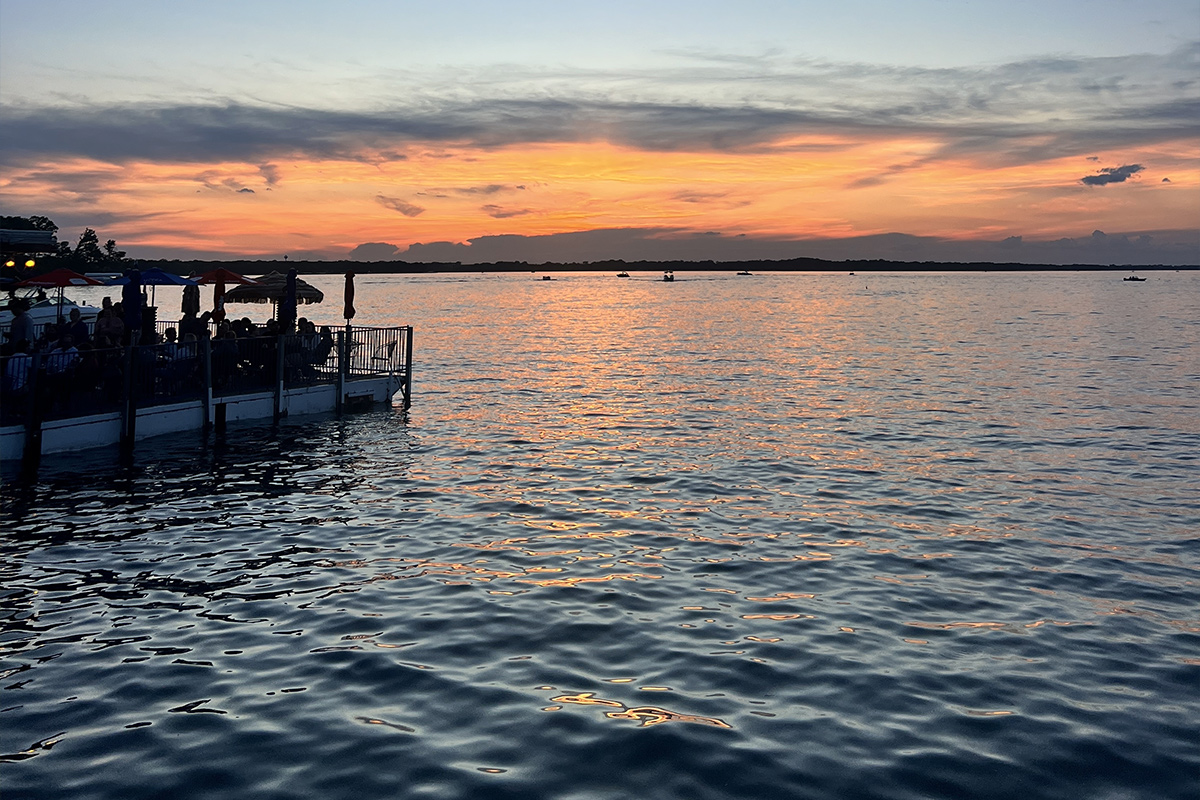 Sunset over the lake in the communities we serve